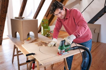 Bosch DIY Stichsäge PST 1000 PEL, 1 Sägeblatt T 144 D, 1 Sägeblatt-Set T234 5tlg., Spanreißschutz, Koffer (650 W, Schnitttiefe 100 mm in Holz, 10 mm in Stahl) - 
